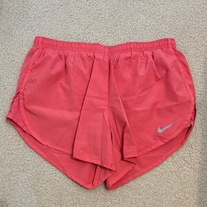 Nike Women’s Coral Pink Running Shorts with Reflective Swoosh